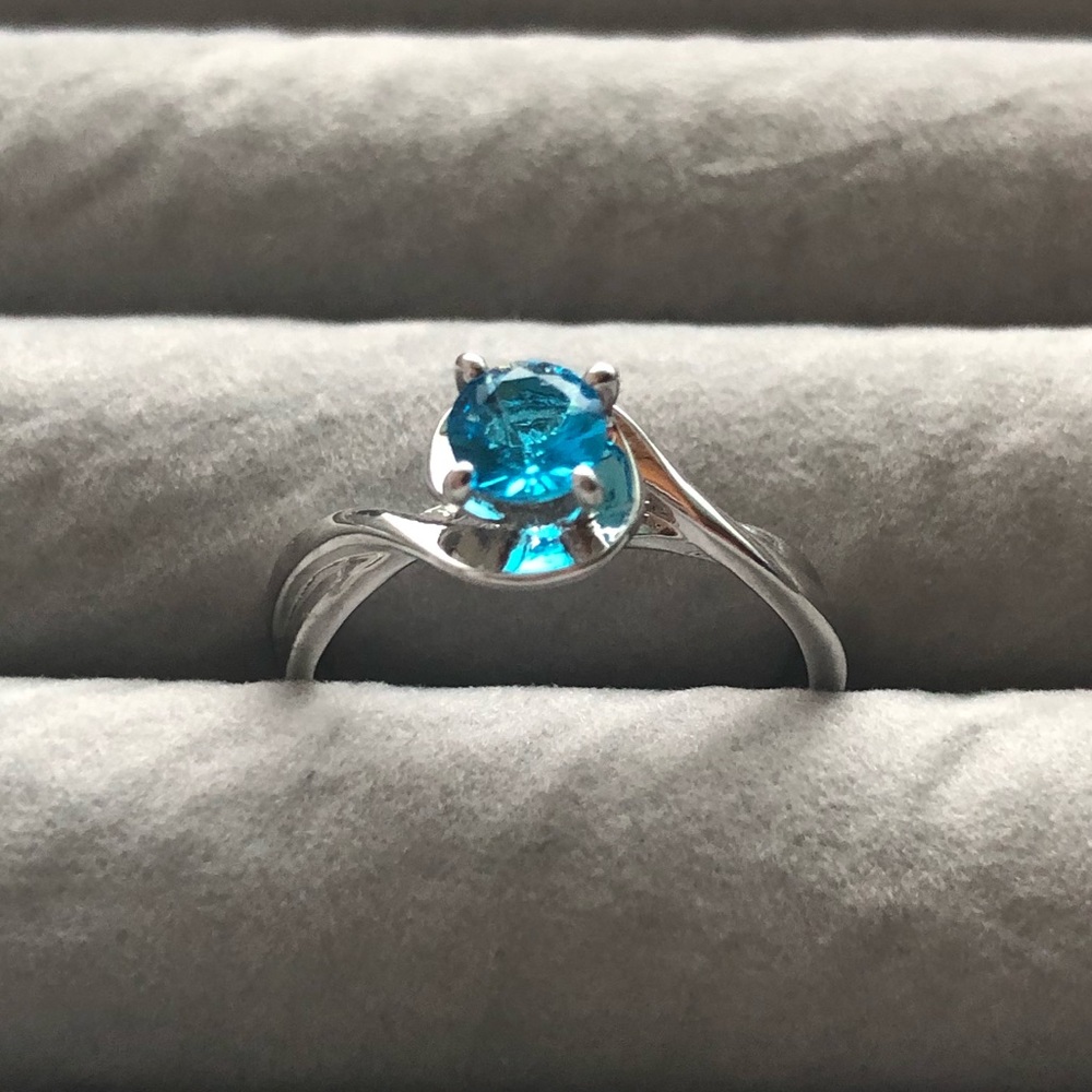 Blue topaz Ring in a sterling silver band